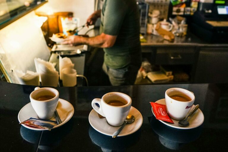 Three Cups of Coffee on Saucers